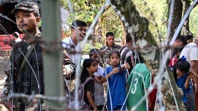 Children rescued from a flash flood at an army camp in Nepal's Nuwakot district. Children rescued from a flash flood at an army camp in Nepal's Nuwakot district.