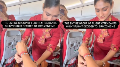 Cabin crew member ties Rakhi to passenger during flight. (Instagram/@sudhanshukaushik) Cabin crew member ties Rakhi to passenger during flight. (Instagram/@sudhanshukaushik)