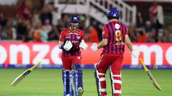 Manchester Super Giants' Liam Dawson celebrates with Leus du Plooy after hitting a six to win the Hundred men's final earlier this month.