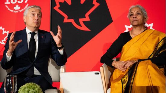 Canada’s Minister of Finance and National Revenue Francois-Philippe Champagne (left) and India’s Minister of Finance and Corporate Affairs Nirmala Sitharaman participate in a discussion at the Canadian Club, in Toronto on Thursday (AP)