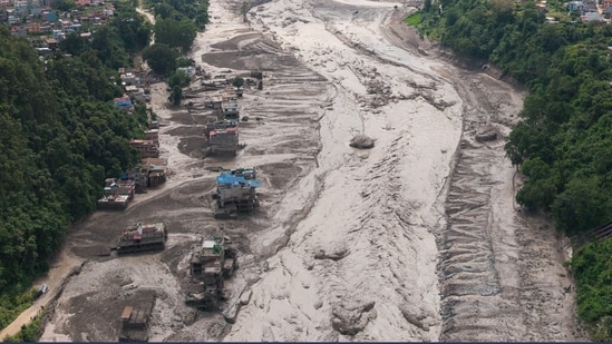 A drone view shows mud covering properties following a flash flood at Trishuli in Nuwakot district, Nepal (REUTERS)