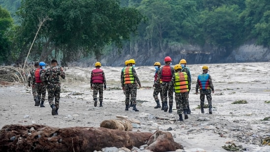 Nepal floods LIVE: Nepal Army personnel conduct a search and rescue operation along side a river area at Charaudi, in Dhading district, Nepal, Friday, Friday, Aug. 28, 2026. Nepal floods LIVE: Nepal Army personnel conduct a search and rescue operation along side a river area at Charaudi, in Dhading district, Nepal, Friday, Friday, Aug. 28, 2026.