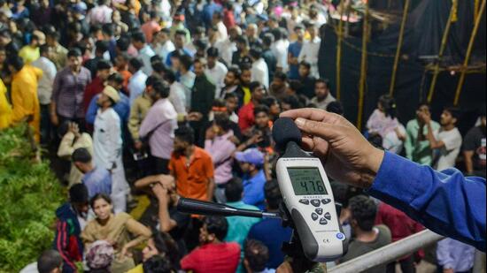 Pune, India - Sept. 12, 2019:Official from Maharashtra Pollution Control Board recorded a noise level during the Ganpati immersion procession at Vishrambag chowk in Pune, India, on Thursday, September 12, 2019. (Photo by Milind Saurkar/Hindustan Times) (Milind Saurkar/HT Photo)