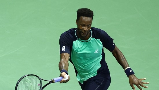 France's Gael Monfils plays a return.