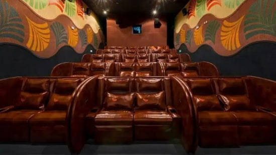 Chinese cinema turns screening halls into lunchtime nap spaces.(South China Morning Post)
