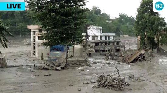 Nepal floods LIVE: A man clicks a picture of devastation in a residential area following a mud-laden flash flood caused by an outburst in the Bhotekoshi River, in Rasuwa. Nepal floods LIVE: A man clicks a picture of devastation in a residential area following a mud-laden flash flood caused by an outburst in the Bhotekoshi River, in Rasuwa.
