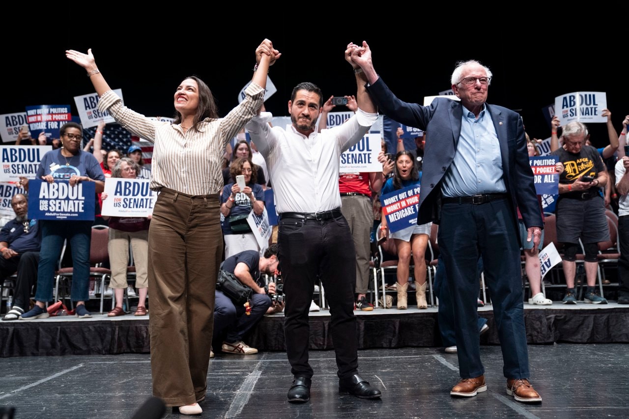 Rep. Alexandria Ocasio-Cortez and Sen. Bernie Sanders at a July rally for El-Sayed in Detroit. Rep. Alexandria Ocasio-Cortez and Sen. Bernie Sanders at a July rally for El-Sayed in Detroit.