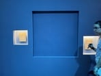A blue panel covers the area where a display case was smashed and a Van Cleef and Arpels necklace was stolen at Vienna's Museum of Applied Arts (MAK), in Vienna, Austria, on August 28, 2026. Two men on August 27, 2026 bought tickets to enter Vienna's Museum of Applied Arts (MAK) before smashing a display case, grabbing a 200-carat platinum and diamond necklace and walking away, police said on August 28. Austrian media said the Van Cleef and Arpels necklace, with 673 precious stones, was worth several million dollars. It is the latest in a series of high-profile heists to hit European museums. (Photo by Jeremy AUDOUARD / AFP)