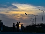 Gram it: This scenic view of sunset makes the lensman capture the silhouettes of children enjoying kite-flying, near Pragati Maidan in Delhi, on Friday. Delhiites can expect to capture more such skies as rains take a pause. As per the forecast issued by IMD, skies will remain cloudy today so do step out and catch some candid moments.
