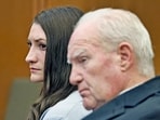 Lindsay Clancy and Kevin Reddington listen to the closing arguments by Jennifer Sprague in the Lindsay Clancy triple murder case in Plymouth Superior Court, in Plymouth, Massachusetts. 