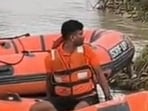 NDRF personnel pulled out three more bodies from the Gandak river in Kushinagar district on August 29. (HT photo)