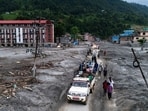 A drone view of people walking on a road and houses in mud, following deadly flash floods and mudslides at Devighat, Nuwakot district, Nepal, (Photo for representation)