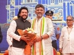 Karnataka chief minister DK Shivakumar and minister B Nagendra at Lok Bhavan, in Bengaluru.