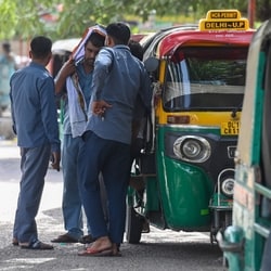 Auto drivers waiting for passengers and rides near Botanical Garden in Noida.