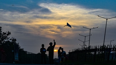 Gram it: This scenic view of sunset makes the lensman capture the silhouettes of children enjoying kite-flying, near Pragati Maidan in Delhi, on Friday. Delhiites can expect to capture more such skies as rains take a pause. As per the forecast issued by IMD, skies will remain cloudy today so do step out and catch some candid moments. (Photo: RAJ K RAJ/HT)