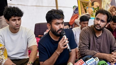 Cockroach Janta Party (CJP) founder Abhijeet Dipke addresses a press conference as party spokepersons Saurav Das and Ashutosh Ranka look on. (PTI) Cockroach Janta Party (CJP) founder Abhijeet Dipke addresses a press conference as party spokepersons Saurav Das and Ashutosh Ranka look on. (PTI)