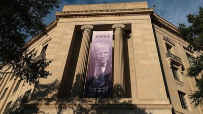 A previous version of the statement by the US Department of Justice said the government agencies had been among the hackers' victims. (Getty Images via AFP)