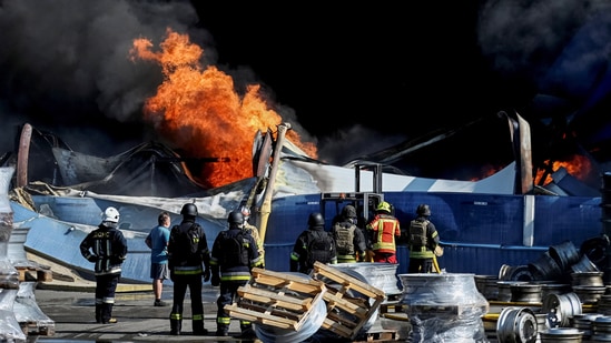 Firefighters work at a site of a Russian drone strike, amid Russia's attack on Ukraine, in Kyiv, Ukraine August 29, 2026.
