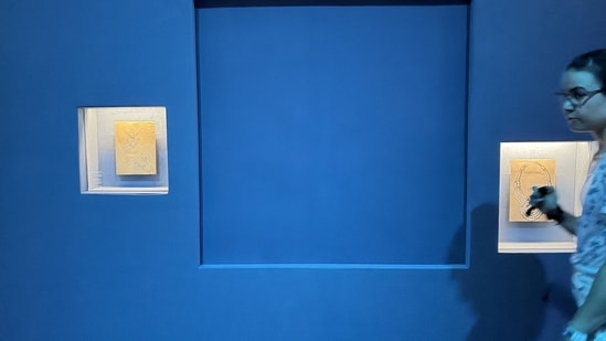 A blue panel covers the area where a display case was smashed and a Van Cleef and Arpels necklace was stolen at Vienna's Museum of Applied Arts (MAK), in Vienna, Austria, on August 28, 2026. Two men on August 27, 2026 bought tickets to enter Vienna's Museum of Applied Arts (MAK) before smashing a display case, grabbing a 200-carat platinum and diamond necklace and walking away, police said on August 28. Austrian media said the Van Cleef and Arpels necklace, with 673 precious stones, was worth several million dollars. It is the latest in a series of high-profile heists to hit European museums. (Photo by Jeremy AUDOUARD / AFP)