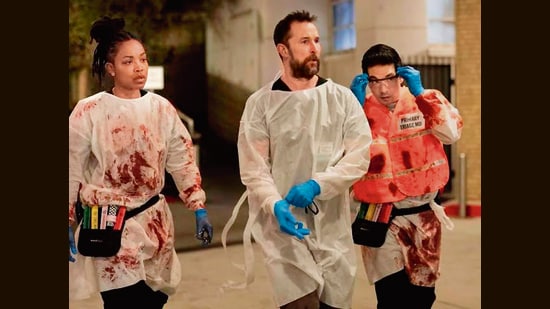 The Pitt (2025-), set in an underfunded, overcrowded ER, is a prime example of a fictional world in which excellence consistently wins over chaos.