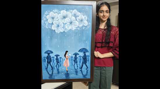 Pallavi with her paintings.