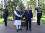 Prime Minister Narendra Modi and Uzbekistan President Shavkat Mirziyoyev shake hands after planting a tree at the Presidential Palace garden under the ‘Ek Ped Maa Ke Naam’ initiative of India and ‘Yashil Makon’ green efforts of Uzbekistan, in Tashkent on Sunday