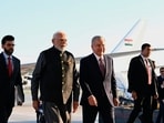 PM Modi in Uzbekistan' LIVE: Uzbekistan's President Shavkat Mirziyoyev, and Prime Minister Narendra Modi at Tashkent-Humo International Airport,(AP)