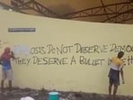 An old graffiti on the walls of the open air theatre that read, “Fascists do not deserve democracy. They deserve a bullet in the head,” was also covered with white paint. (X/Screengrab)