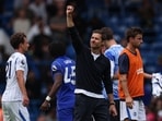 Chelsea's Spanish Manager Xabi Alonso (C) waves to supporters at the end of the English Premier League football match between Chelsea and Brighton and Hove Albion