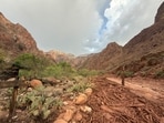 Phantom Ranch evacuees described a frightening Grand Canyon flash flood, while visitors shared relief, sadness and concern after seeing the damage.. (Parth Desai via AP)