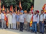 The protesting teachers alleged that instead of resolving long-pending grievances, the government was attempting to suppress employees through disciplinary notices and warnings. (HT PHOTO)