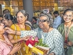 Relatives welcome 37 pilgrims from Raigad and Mumbai who were stranded in Nepal as they arrive safely at Mumbai airport 
