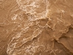 Rescue teams evacuated dozens after a flash flood destroyed bridges and trails in the Grand Canyon's Bright Angel Creek area.