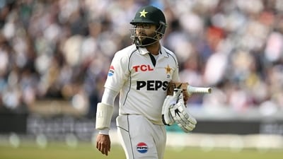 Pakistan's Imam-ul-Haq reacts as he walks back to the pavilion having lost his wicket without scoring on the day three of the first test match between England and Pakistan (AFP)