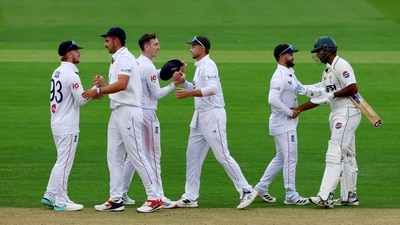 England's Harry Brook and Joe Root celebrate after the match (Action Images via Reuters)