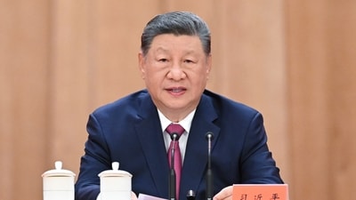 President Xi Jinping handed Zongqi responsibility of the Western Theatre Command in 2016. (Xinhua via AP) President Xi Jinping handed Zongqi responsibility of the Western Theatre Command in 2016. (Xinhua via AP)