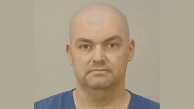 Benjamin Larson is charged with stalking after police found human skulls and serial killer memorabilia in his Wisconsin home (Dane County Sheriff's Office) Benjamin Larson is charged with stalking after police found human skulls and serial killer memorabilia in his Wisconsin home (Dane County Sheriff's Office)