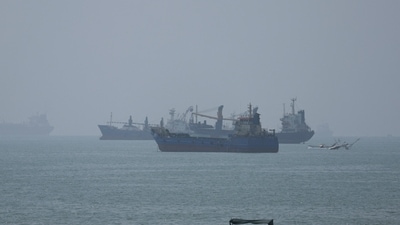 Vessels in the Strait of Hormuz are visible near the beach of Bandar Abbas, Iran, August 28, 2026. (via REUTERS)