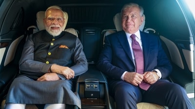 Prime Minister Narendra Modi with Uzbekistan President Shavkat Mirziyoyev in a car, in Tashkent. (X/@narendramodi) Prime Minister Narendra Modi with Uzbekistan President Shavkat Mirziyoyev in a car, in Tashkent. (X/@narendramodi)