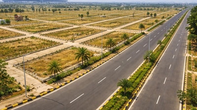 Gaurs Group has acquired 35-acre land parcels along Yamuna Expressway from ICICI Bank for around ₹700 crore. (Photo for representational purposes only) (ChatGPT generated image) Gaurs Group has acquired 35-acre land parcels along Yamuna Expressway from ICICI Bank for around ₹700 crore. (Photo for representational purposes only) (ChatGPT generated image)
