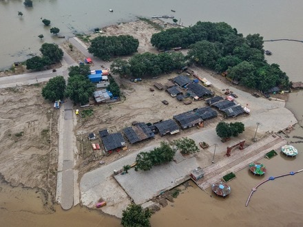 Prayagraj: An aerial view shows the Sangam area inundated with floodwaters from the swollen Ganga and Yamuna rivers, in Prayagraj, Uttar Pradesh, Sunday, Aug. 30, 2026. (PTI Photo)(PTI08_30_2026_000051A)