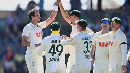 Mitchell Starc celebrating a wicket against Bangladesh.