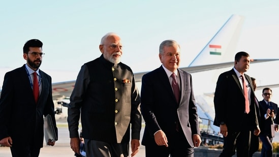 PM Modi in Uzbekistan' LIVE: Uzbekistan's President Shavkat Mirziyoyev, and Prime Minister Narendra Modi at Tashkent-Humo International Airport,