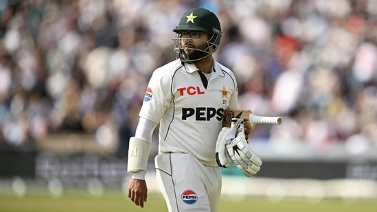 Pakistan's Imam-ul-Haq reacts as he walks back to the pavilion having lost his wicket without scoring on the day three of the first test match between England and Pakistan