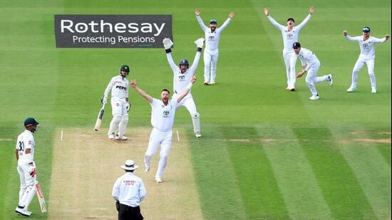 England's Ollie Robinson appeals successfully against Pakistan's Azan Awais on Sunday. (Action Images via Reuters)