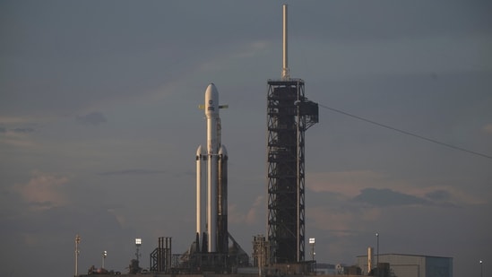 NASA's Nancy Grace Roman Space Telescope, encapsulated in a protective payload fairing atop a SpaceX Falcon Heavy rocket, is seen at sunrise, Saturday, Aug. 29, 2026, at Launch Complex 39A at NASA's Kennedy Space Center in Florida. (Joel Kowsky/NASA via AP)
