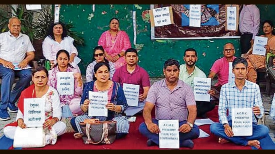 The protesting teachers have been pressing for the immediate appointment of a regular principal and the clearance of long-delayed CAS promotion cases. (HT FILE)