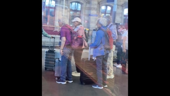 The woman shared a picture of elderly travellers in Europe walking with their luggage.