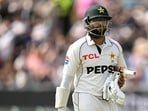 Pakistan's Imam-ul-Haq reacts as he walks back to the pavilion having lost his wicket without scoring on the day three of the first test match between England and Pakistan