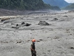 Nepal rescue operation LIVE: A Nepal Army soldier works during a search and rescue operation near the Trishuli Hydropower Project site, following deadly flash floods and mudslides, in Rasuwa district. 